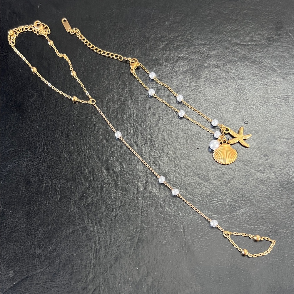 Francesca's Collections Gold Layered Shell & Starfish Bracelet with White Beads